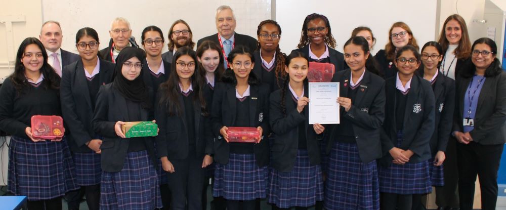 Members of CSES, CCHS staff and some STEM club students showing kits and certificate. Adults in image back row: Mr Stephen Lawlor, CCHS Headteacher; Mr Roy Hilsley, CSES Trustee; Mr Adam Wood, President CSES; Mr Ed Bye, CSES; Mrs Jo Cross, Deputy Headteacher CCHS; Mrs Preena Kurian, STEM and Physics lead CCHS.